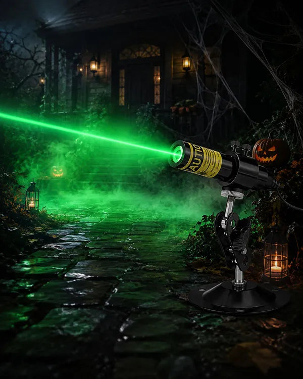 Green laser projector creating a glowing swamp effect in low-lying fog